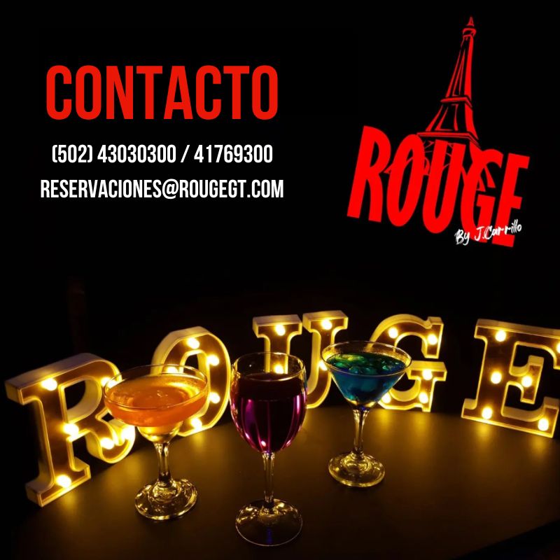 Tragos de Rouge frente a letras iluminadas